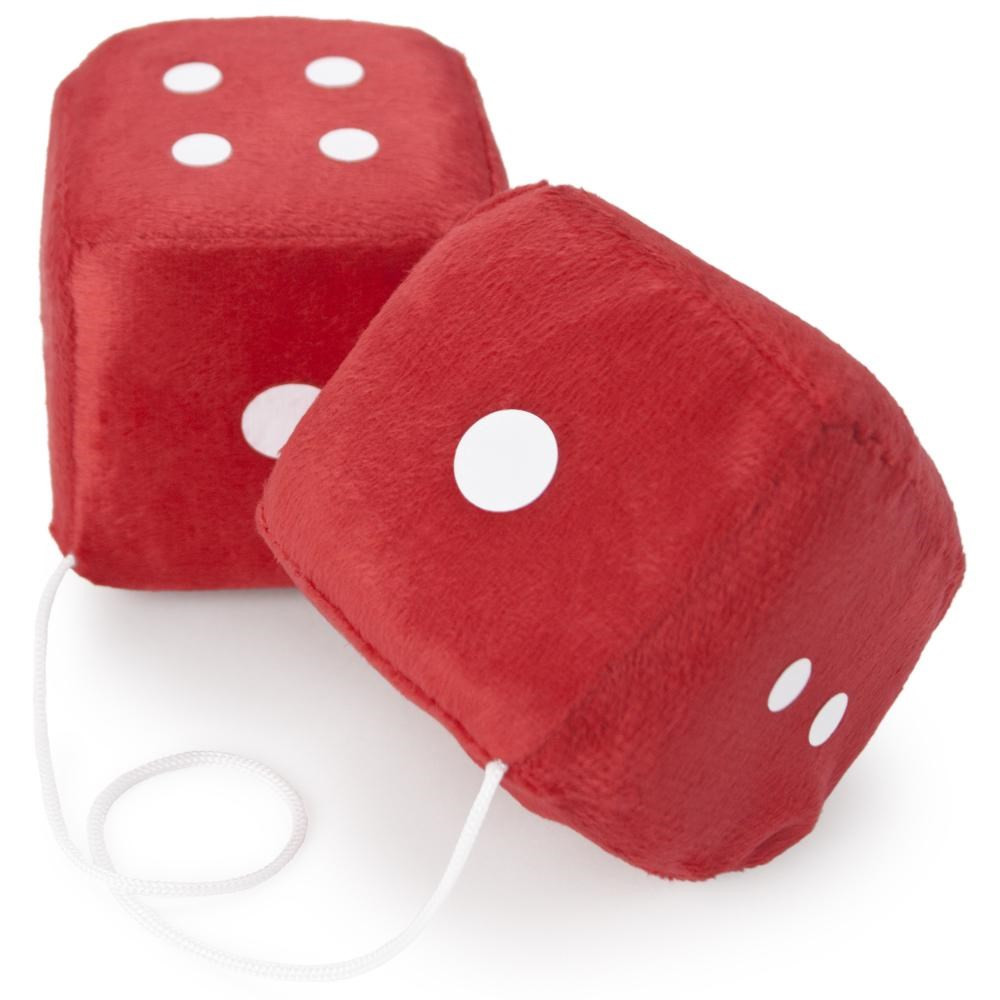 fuzzy dice haning from rear view mirror of classic car Stock Photo